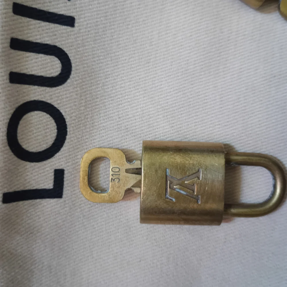 Authentic Louis Vuitton Lock & Key # 310 - Picture 9 of 11